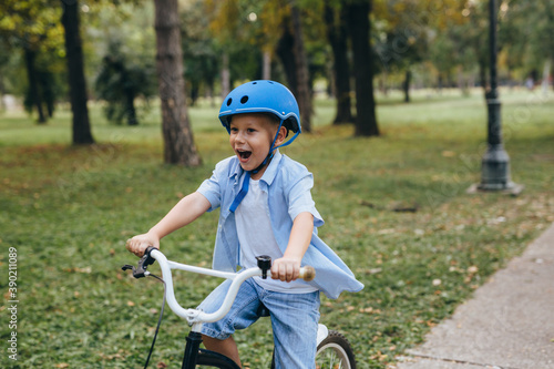 boy riding bike in the public park