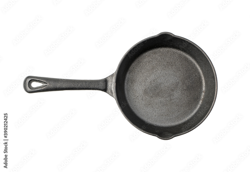 Cast iron frying pan top view isolated on a white background. Concept of kitchen utensils. Cast iron frying pan top view isolated on a white background. Concept of kitchen utensils.