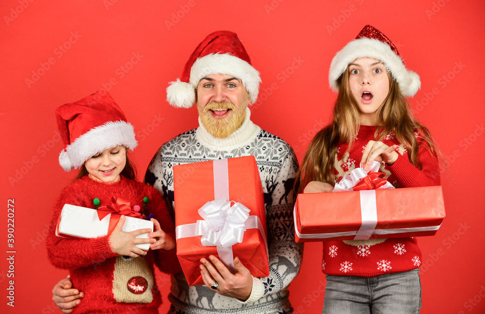 Christmas eve concept. Family time. Holly jolly christmas. Surprising miracle. Dad kids having fun. Father and little daughters celebrate new year together. Christmas becomes special with children Christmas eve concept. Family time. Holly jolly christmas. Surprising miracle. Dad kids having fun. Father and little daughters celebrate new year together. Christmas becomes special with children
