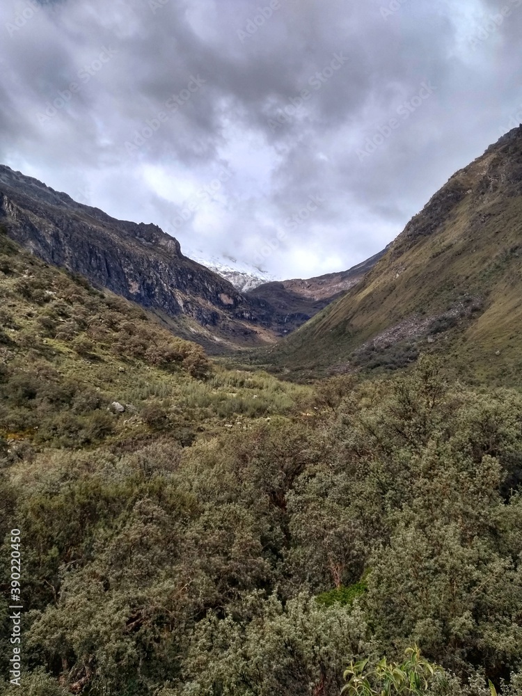 Fototapeta premium Trekking to Laguna 69, Huaraz, Peru. In Huascarán National Park, this lagoon/lake is at 4650m above sea level. The hike can be challenging due to the high altitude but it has outstanding landscapes.