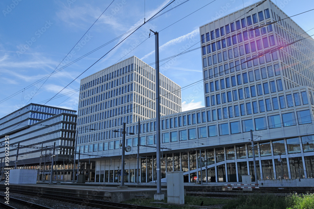 The modern architecture and SBB buildings of the Europa Allee and opposite the tracks along Zürich main station