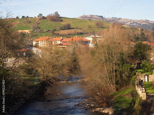 The stone bridge over the river in Liérganes photo