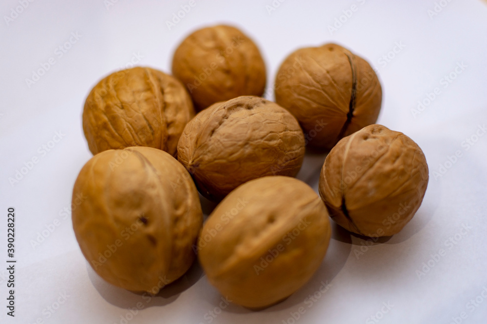 Walnut. A handful of walnuts on the table Walnut. A handful of walnuts on the table