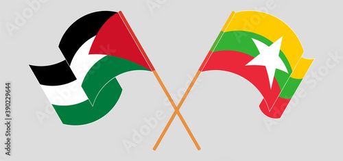 Crossed and waving flags of Palestine and Myanmar