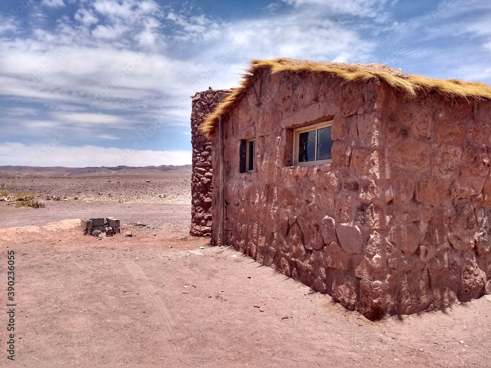 Tradicional House - Yerbas Buenas, Valle del Arcoiris - Rainbow Valley, San Pedro de Atacama, Chile. Beautiful and colorful mountains in the Atacama desert, one of the driest places in the world. 