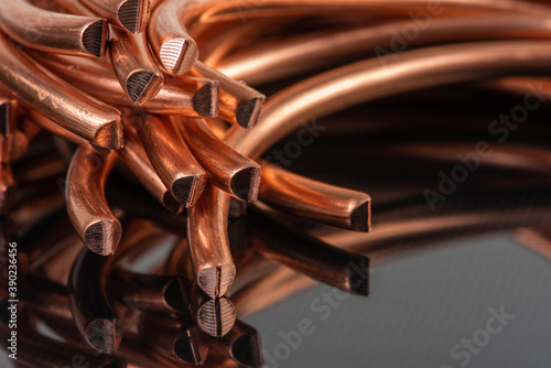 Cut copper wire closeup, component of metal and energy industry