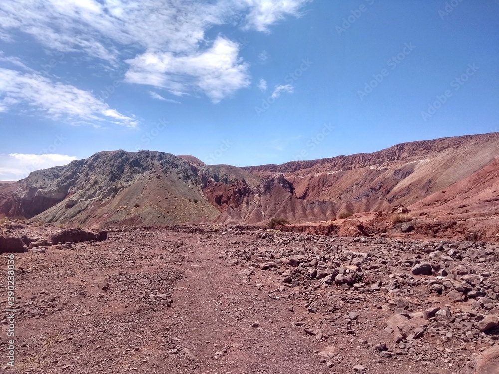 Fototapeta premium Yerbas Buenas, Valle del Arcoiris - Rainbow Valley, San Pedro de Atacama, Chile. Beautiful and colorful mountains in the Atacama desert, one of the driest places in the world. 