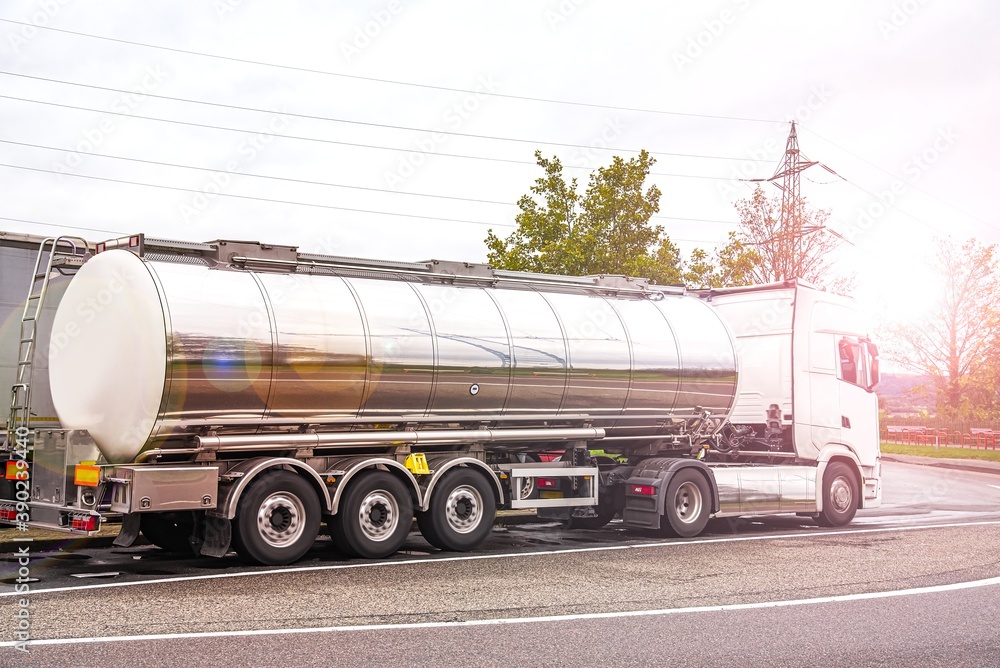 A big fuel tanker truck ,  on the roads of Europe . Logistics and transportation