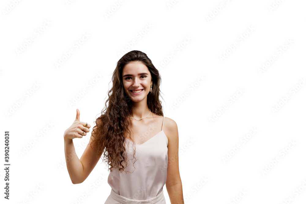 Thumb up. Business woman isolated on white background. Girl with curly hair smiles. Female model. Advert for on-line stores, courses, social networks Thumb up. Business woman isolated on white background. Girl with curly hair smiles. Female model. Advert for on-line stores, courses, social networks