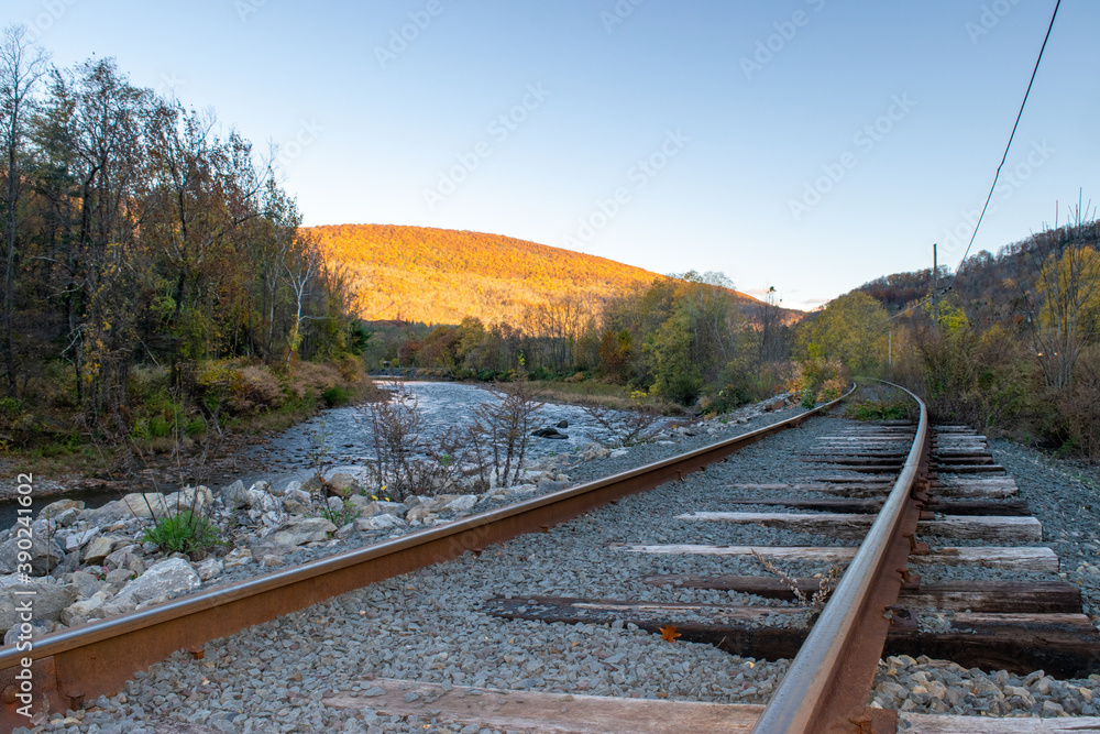 Fototapeta premium Railroad Tracks, Stream and Mountain 