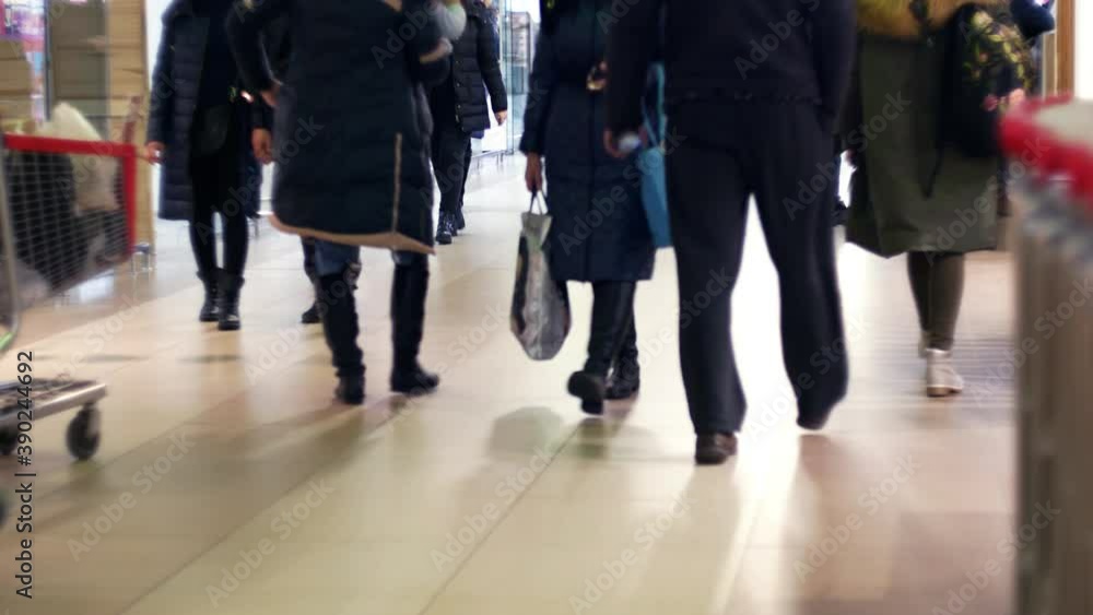 Shopping and product trading. Urban people walk inside the store mall hypermarket Shopping and product trading. Urban people walk inside the store mall hypermarket