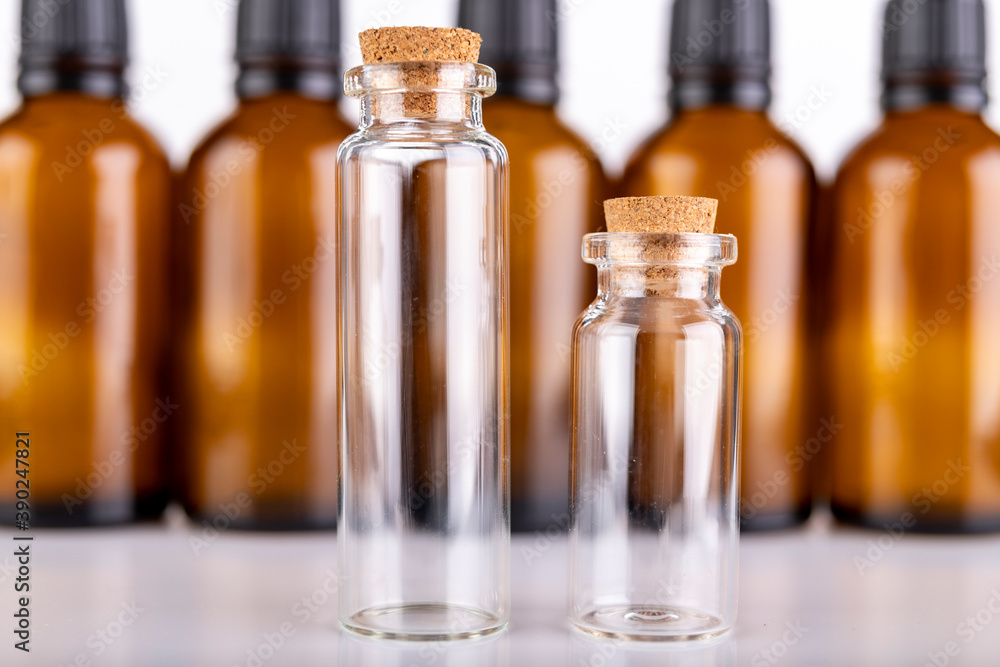 Small glass bottles for storing liquids. Containers used in pharmaceuticals.