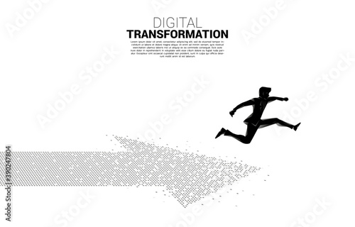 Silhouette of businessman jumping on the arrow from pixel. concept of digital transformation of business.