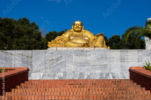 Buddha sculpture at Bacalh  a Buddha Eden  asian style garden  Quinta dos Loridos  Bombarral  Portugal  September 10  2020