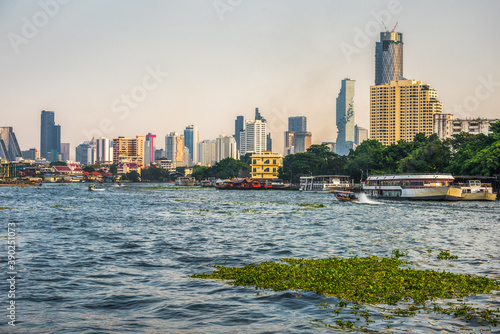 Obraz na płótnie City Skyline as Seen from the Tourist Boat on Chao Phraya River in Bangkok, Thailand w salonie
