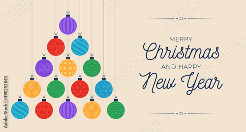 Christmas and new year greeting flat cartoon card. Creative Xmas tree made colorful bauble balls on sand background for Christmas and New Year celebration.