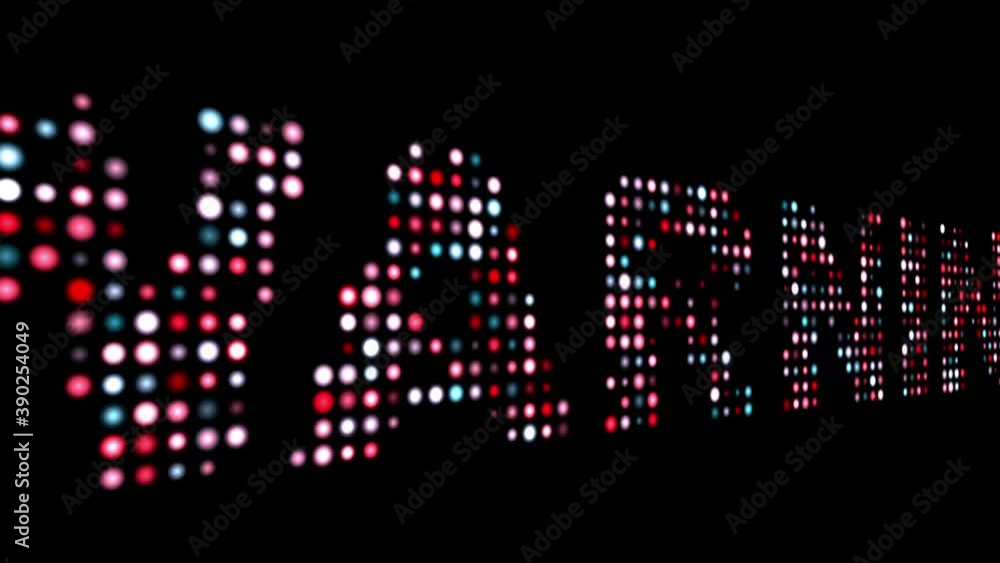 Warning colorful led text over black Warning colorful led text over black