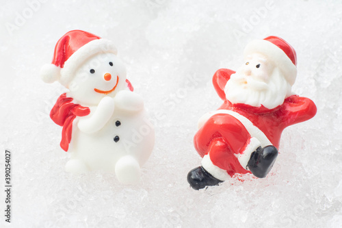 Santa claus and snowman on snow happy Christmas and happy new year day
