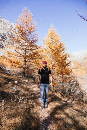 Young boy walking in the mountains © Limon Stock