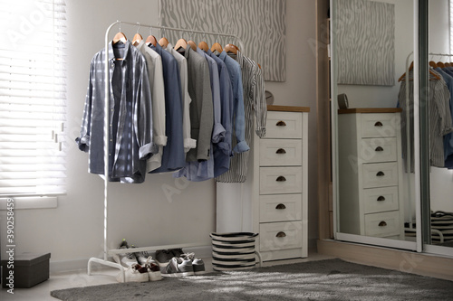 Wallpaper Mural Dressing room interior with clothing rack and chest of drawers Torontodigital.ca