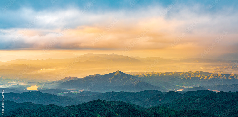 The view of Dingdal and windmills at sunrise at Gia Mountain, Heyuan, Guangdong The view of Dingdal and windmills at sunrise at Gia Mountain, Heyuan, Guangdong