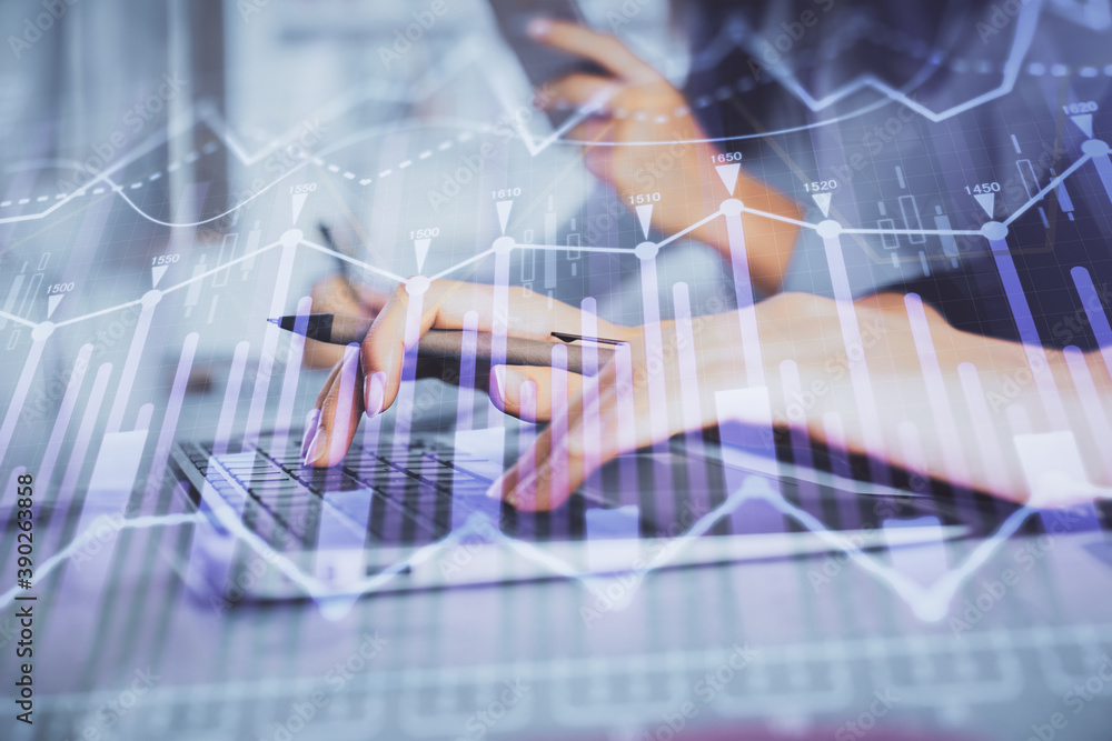 Multi exposure of woman hands typing on computer and financial graph hologram drawing. Stock market analysis concept. Multi exposure of woman hands typing on computer and financial graph hologram drawing. Stock market analysis concept.