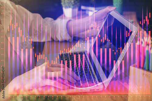 Double exposure of woman hands typing on computer and forex chart hologram drawing. Stock market invest concept.