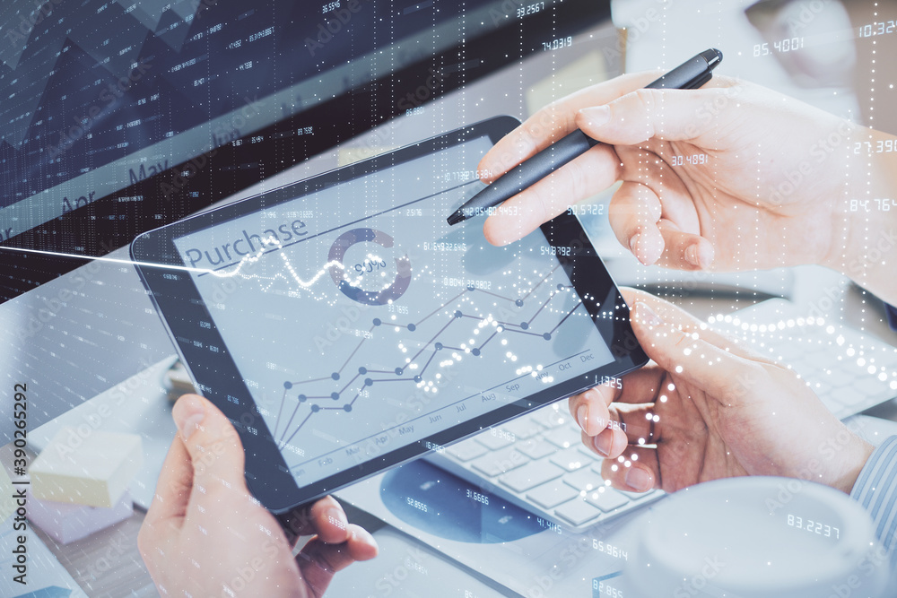 Fototapeta premium Double exposure of man's hands holding and using a phone and financial chart drawing. Market analysis concept.