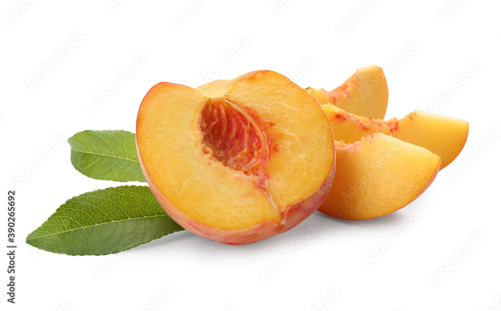 Cut fresh ripe peach with leaves on white background Cut fresh ripe peach with leaves on white background