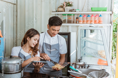 portrait of young men and women prepare food in mika plastic photo