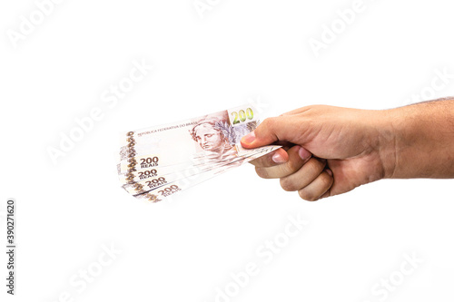 hand holding two hundred reais bank notes, brazil money, payment concept, grand prize or profit photo