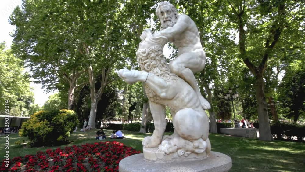 Statue of Hercules' fight with the Nemean lion in El Retiro gardens, Madrid, Spain Statue of Hercules' fight with the Nemean lion in El Retiro gardens, Madrid, Spain