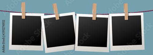 Photo frames hanging on rope