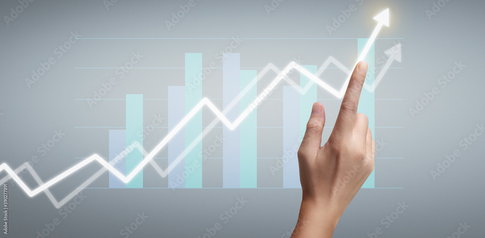 Hand touching a graphs of financial indicator accounting market economy analysis chart Hand touching a graphs of financial indicator accounting market economy analysis chart