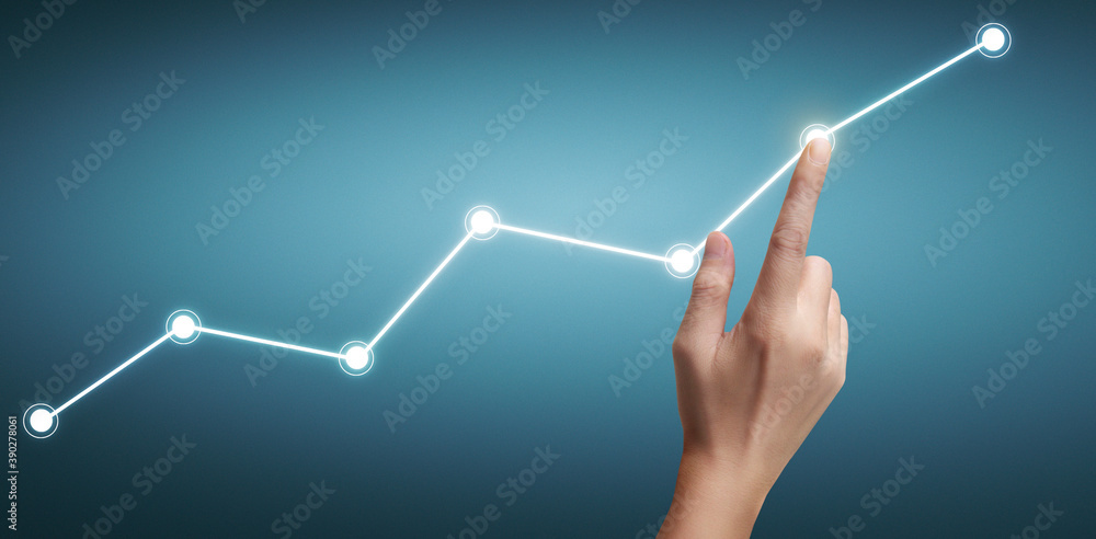 Hand touching a graphs of financial indicator accounting market economy analysis chart Hand touching a graphs of financial indicator accounting market economy analysis chart