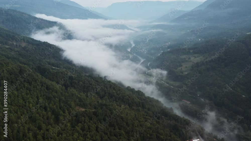 Amazing landscape with low clouds and river stream in the Balkan mountains Amazing landscape with low clouds and river stream in the Balkan mountains
