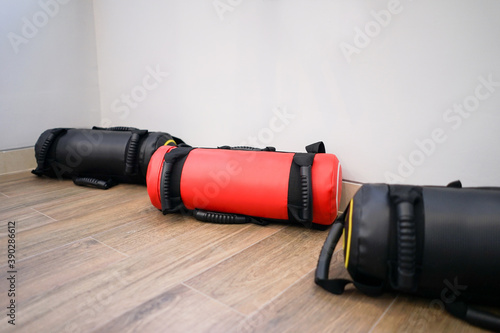 Fitness power bag or gym weight bag equipment at gym for functional training