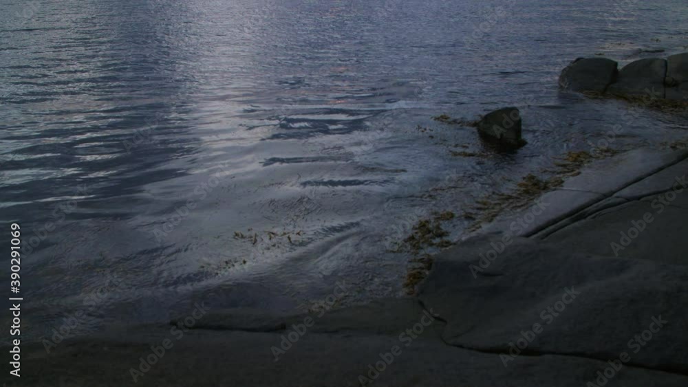 Cinematic pan of sunset in a Swedish archipelago Cinematic pan of sunset in a Swedish archipelago