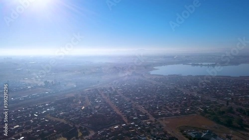 Wallpaper Mural Drone flying above the cloud of air pollution with a ray of sunlight Torontodigital.ca