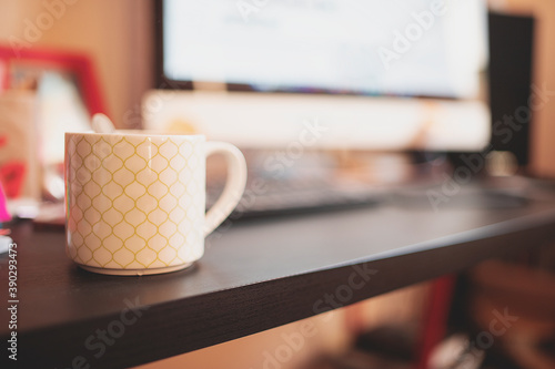 cup of tea on working place of freelancer