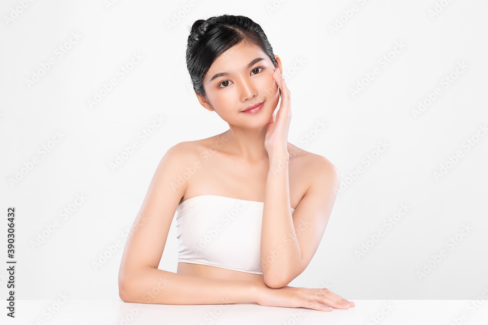Beautiful young asian woman with clean fresh skin on white background, Face care, Facial treatment, Cosmetology, beauty and spa, Asian women portrait Beautiful young asian woman with clean fresh skin on white background, Face care, Facial treatment, Cosmetology, beauty and spa, Asian women portrait