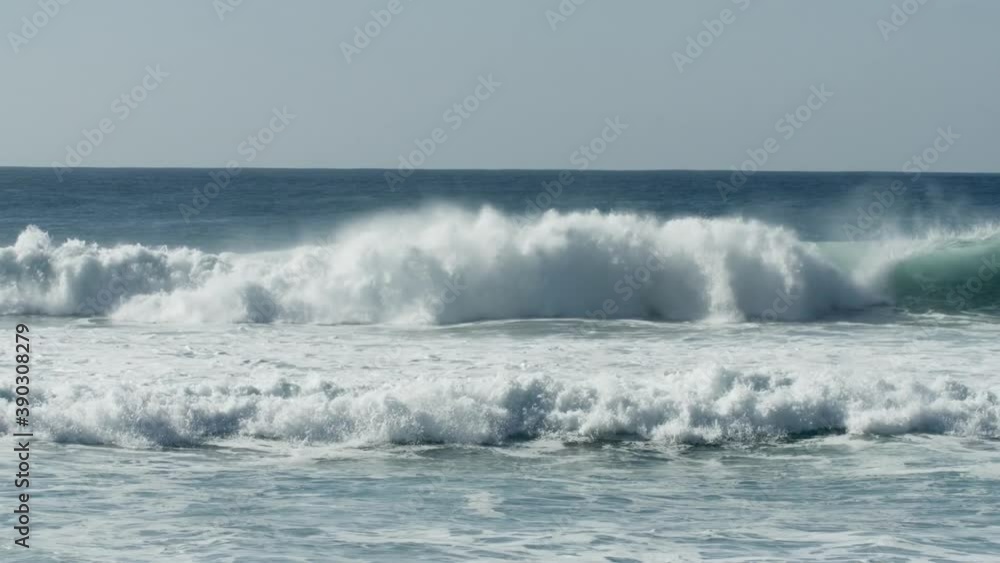 Rolling waves on the sea, expansive seascape of Sagres in Portugal Rolling waves on the sea, expansive seascape of Sagres in Portugal