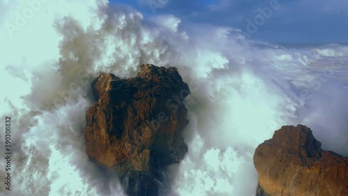 Huge waves crashing reefs before hurricane makes landfall, waves hitting the cliffs with huge splashes