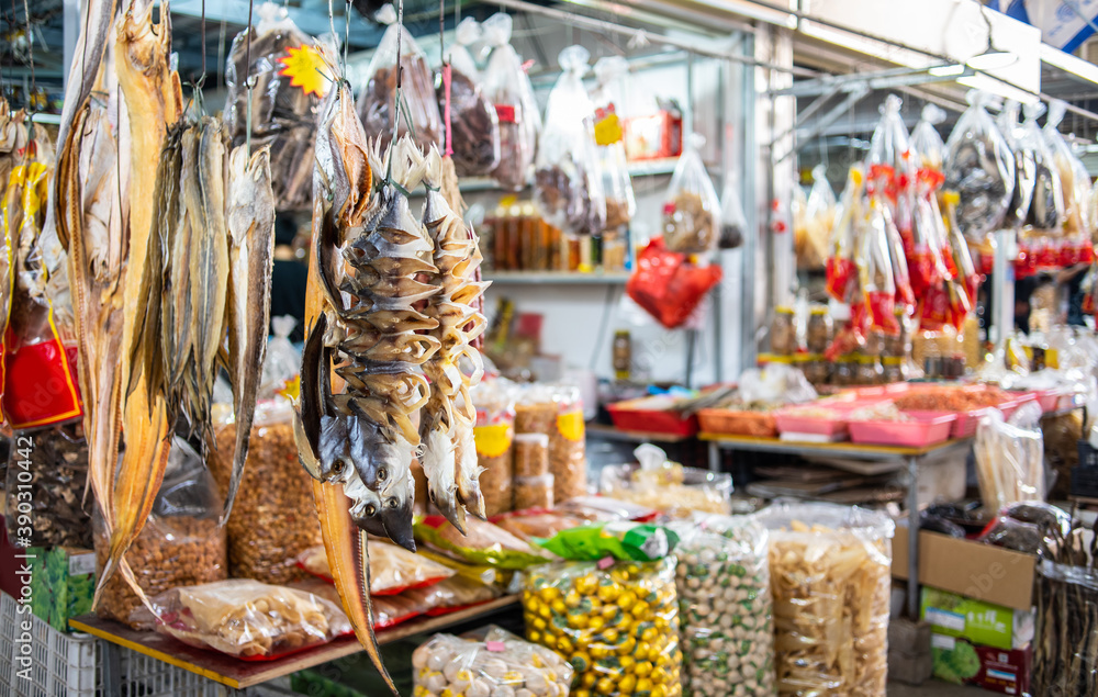 The seafood shop is covered with dried salted fish and seafood