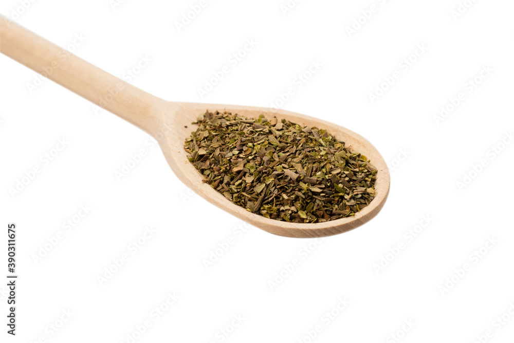 Oregano spice in wooden spoon isolated. Oregano spice in wooden spoon isolated.