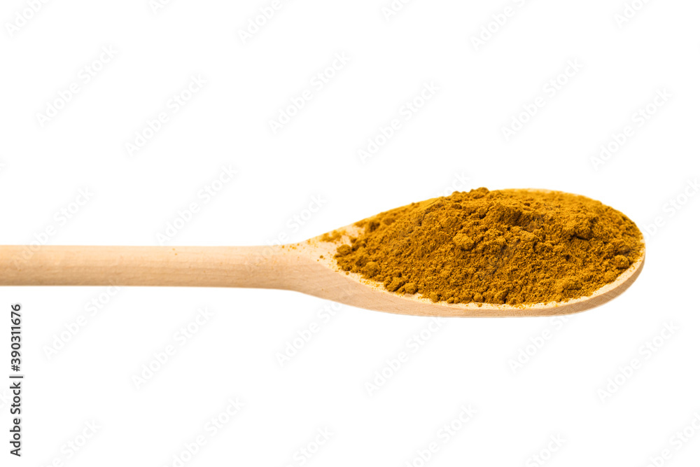 Curry in wooden spoon isolated on white. Curry in wooden spoon isolated on white.