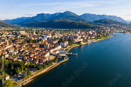 Tableau sur toile View from drone of summer Luino cityscape and Lake Maggiore, province of Varese,
