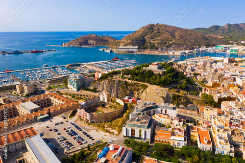 Aerial view of cityscape and marina of Spanish city of Cartagena in sunny summer day, Region of Murcia © JackF