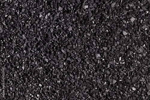 Close-up activated carbon texture. Coconut charcoal.