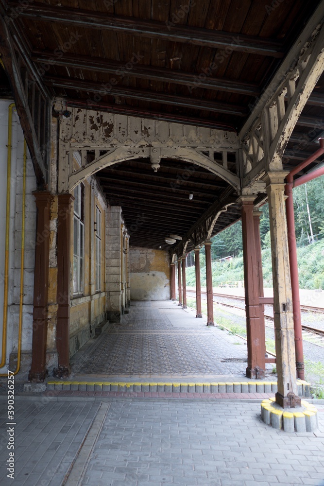 wooden carved arcades in a historical train station